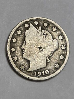 1910 Liberty Head Nickel Very popular coin getting scarce now. I would rate G-4